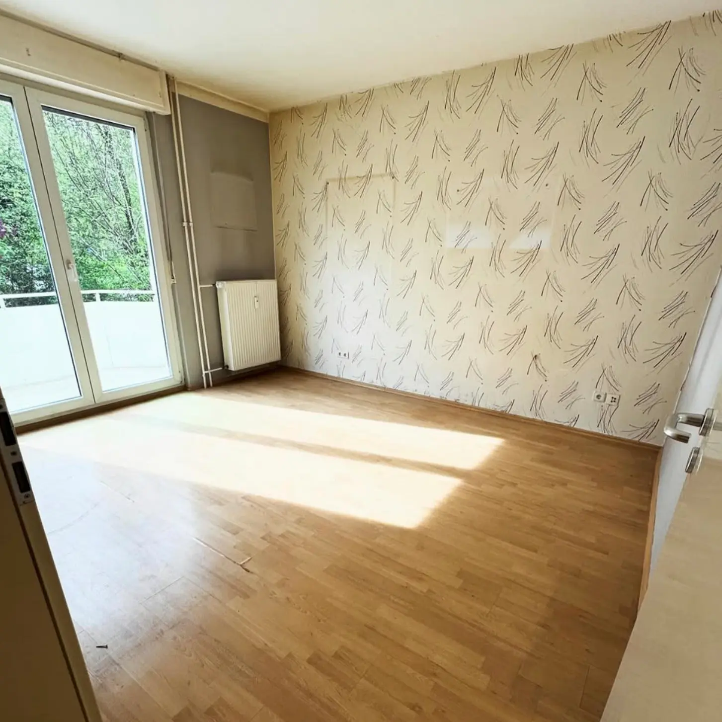quellenberg_dienstleistungen_haushaltsaufloesung2 Gräumtes Wohnzimmer leer